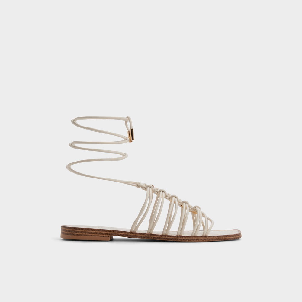 Unoma in White Bone - Strappy flat sandal | Aldo discount