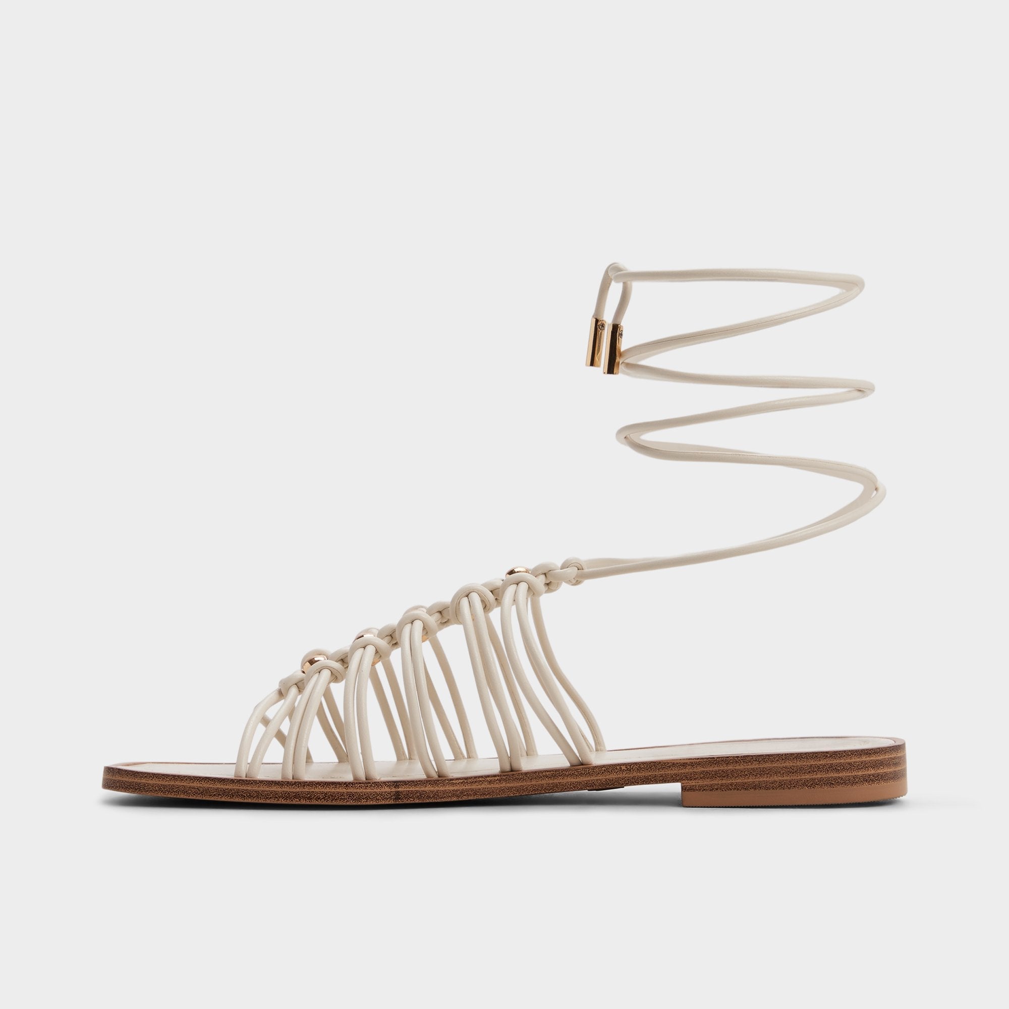 Unoma in White Bone - Strappy flat sandal | Aldo discount